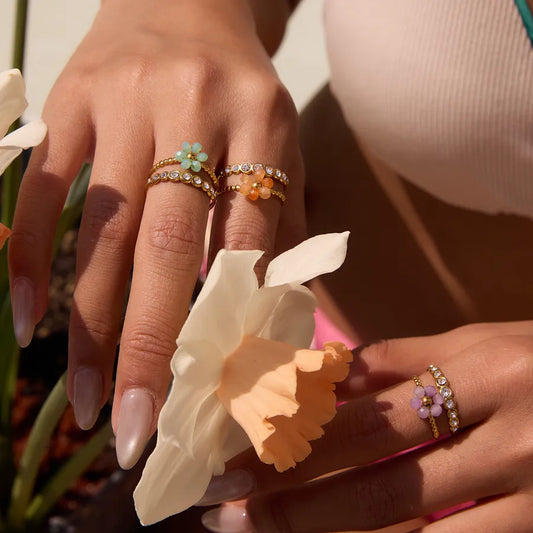 Luxury floral statement ring for women, designed with vibrant colors and a polished finish, perfect for vacation and casual elegance."